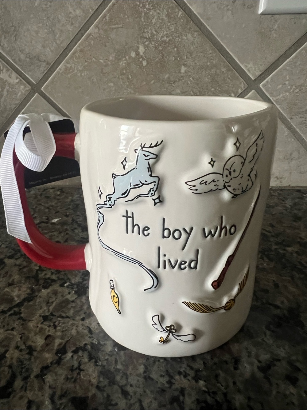 Warner Bros. White Ceramic Mug with Red Handle - 'the boy who lived'